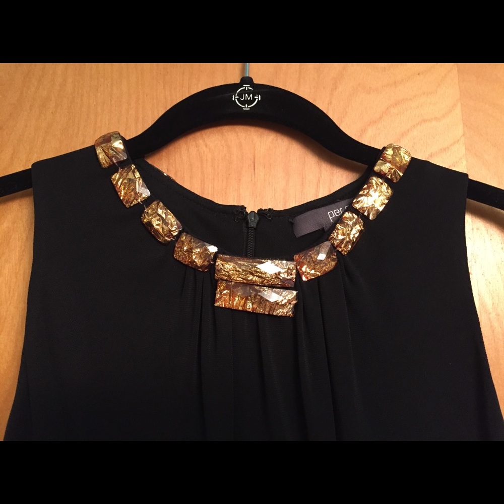 Black Per Se top with bronze-colored embellishment